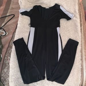 low v neck black and white jumpsuit.